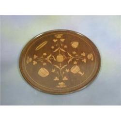 A 19th Century circular inlaid mahogany tea tray 23" £75-100...