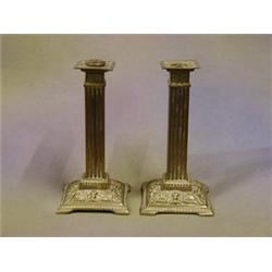 A pair of brass fluted column candlesticks converted for use as table lamps £10-20...