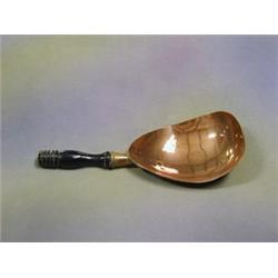 A copper scoop with turned ebony handle, £15-25...