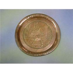 A circular embossed copper Johnnie Walker advertising tray £10-20...