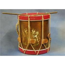 A side drum decorated the Royal Arms complete with drum sticks £30-50...