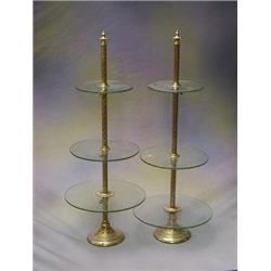 A pair of 19th Century brass and glass adjustable circular cake stands   £75-125...