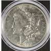Image 1 : 1921-P MORGAN SILVER DOLLAR, IN CAPSULE AND SLEEVE
