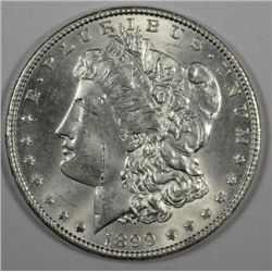 1899 MORGAN DOLLAR NICE CH BU BUT HAS A SCRATCH ON FACE AND MARK ON RIM