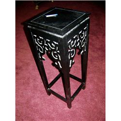 BLACK STAND WITH CUTOUTS
