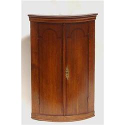 A George III Oak Hanging Corner Cupboard, cro...