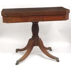 A Regency Mahogany Card Table, the shaped rec...
