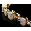 Image 2 : 14K YELLOW GOLD 12.00CT OPAL 0.85CT DIAMOND BRACELET