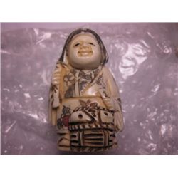 Hand Carved Woman at work Bone Netsuke