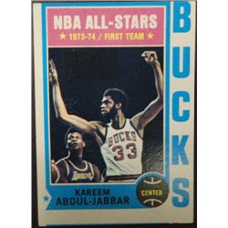 1974 / 75 Topps Basketball #1 Kareem Abdul-Jabbar.  EX off center top to bottom.