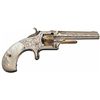 Image 4 : Attractive Engraved Nickel and Gold Smith & Wesson Model No. 1 3rd Issue Revolver with Pearl Grips