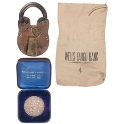 Three Wells Fargo Marked Items Including a Cased 50th Anniversary Silver Coin