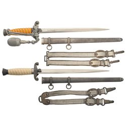 Two Nazi Heer Daggers with Scabbards and Belt Hangers