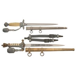 Two Nazi Daggers with Scabbards and Portapees