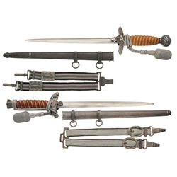 Two World War II Nazi Military Daggers with Scabbards, Hangers and Portapees