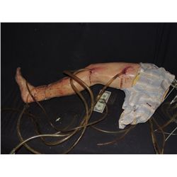 SEVERED SILICONE LEG WITH TUBES PUMPING INTO IT