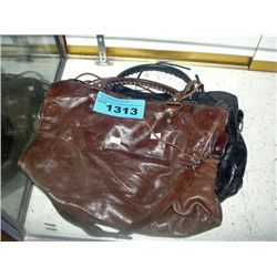 Brown leather ladies handbag and black leather