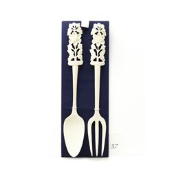 Genuine ivory carved fork and spoon set
