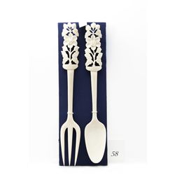 Genuine ivory carved fork and spoon set