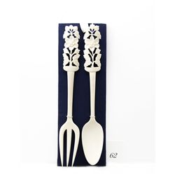 Genuine ivory carved fork and spoon set