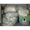 Image 1 : Shelf lot of assorted bedding and small bath mats