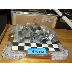 Chess board with chess pieces (incomplete set)