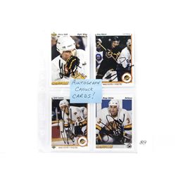 4 autographed canucks NHL collectors cards