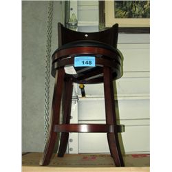 Swivel barstool with black leather padded seat