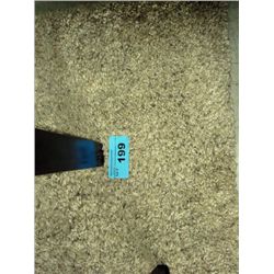 Approx 6F by 8F off white shag area rug