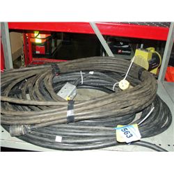 Shelf lot of heavy gauge black electrical cords;