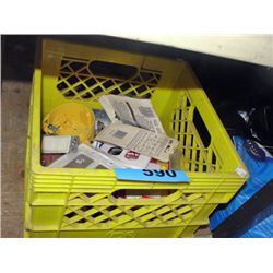 yellow milk crate filled with light switches and