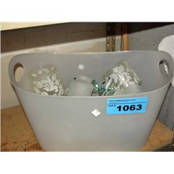White plastic laundry hamper with assorted light