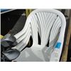 Image 1 : Lot of 4 white plastic stacking patio chairs