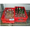 Image 1 : 2 red plastic pop crates with vintage pop bottles