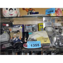 Shelf lot of small assorted electronics and