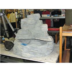 Faux stone garden fountain