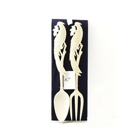 Hand carved genuine ivory fork and spoon set