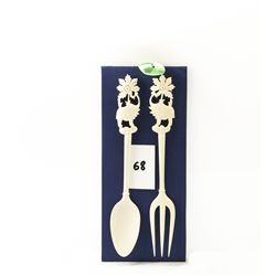 Hand carved genuine ivory fork and spoon set