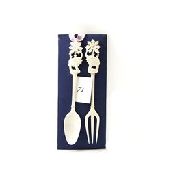 Hand carved genuine ivory fork and spoon set