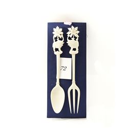 Hand carved genuine ivory fork and spoon set