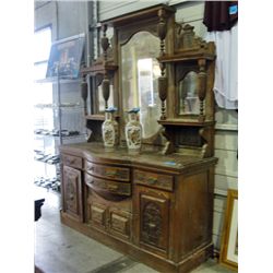 Mid to late 1800s heavily carved mahogany mirrored