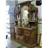 Image 1 : Mid to late 1800s heavily carved mahogany mirrored