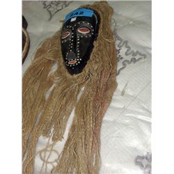 Carved wooden decorative mask