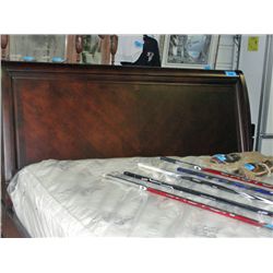 Cherry finish king size bed; headboard footboard