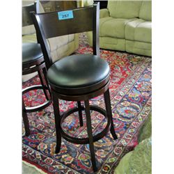 Swivel bar stool with black leather padded seat