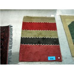 Small hand woven wool throw rug