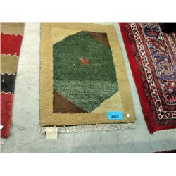 Small hand woven wool throw rug