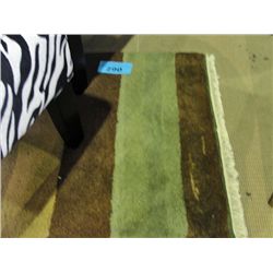 Small hand knotted wool throw rug