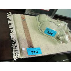 Small hand knotted wool throw rug