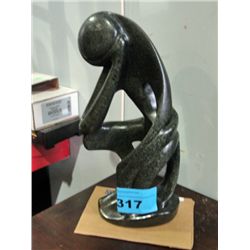 Hand crafted stone carved sculpture